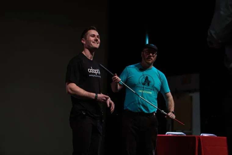 Brendan coaching an adaptive athlete