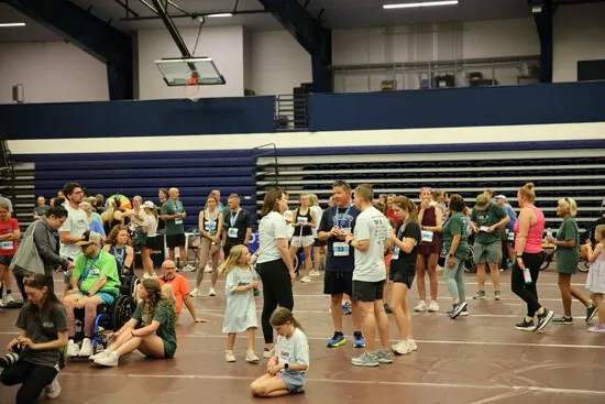 Participants gathered in the gym before the race
