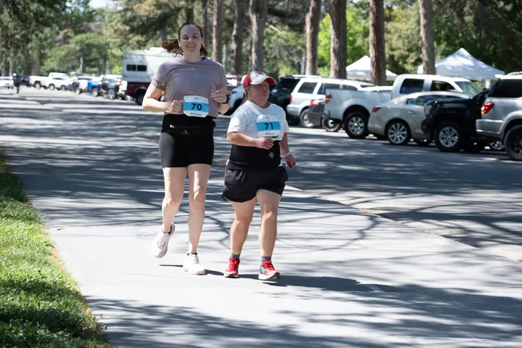 Two participants walking the course together
